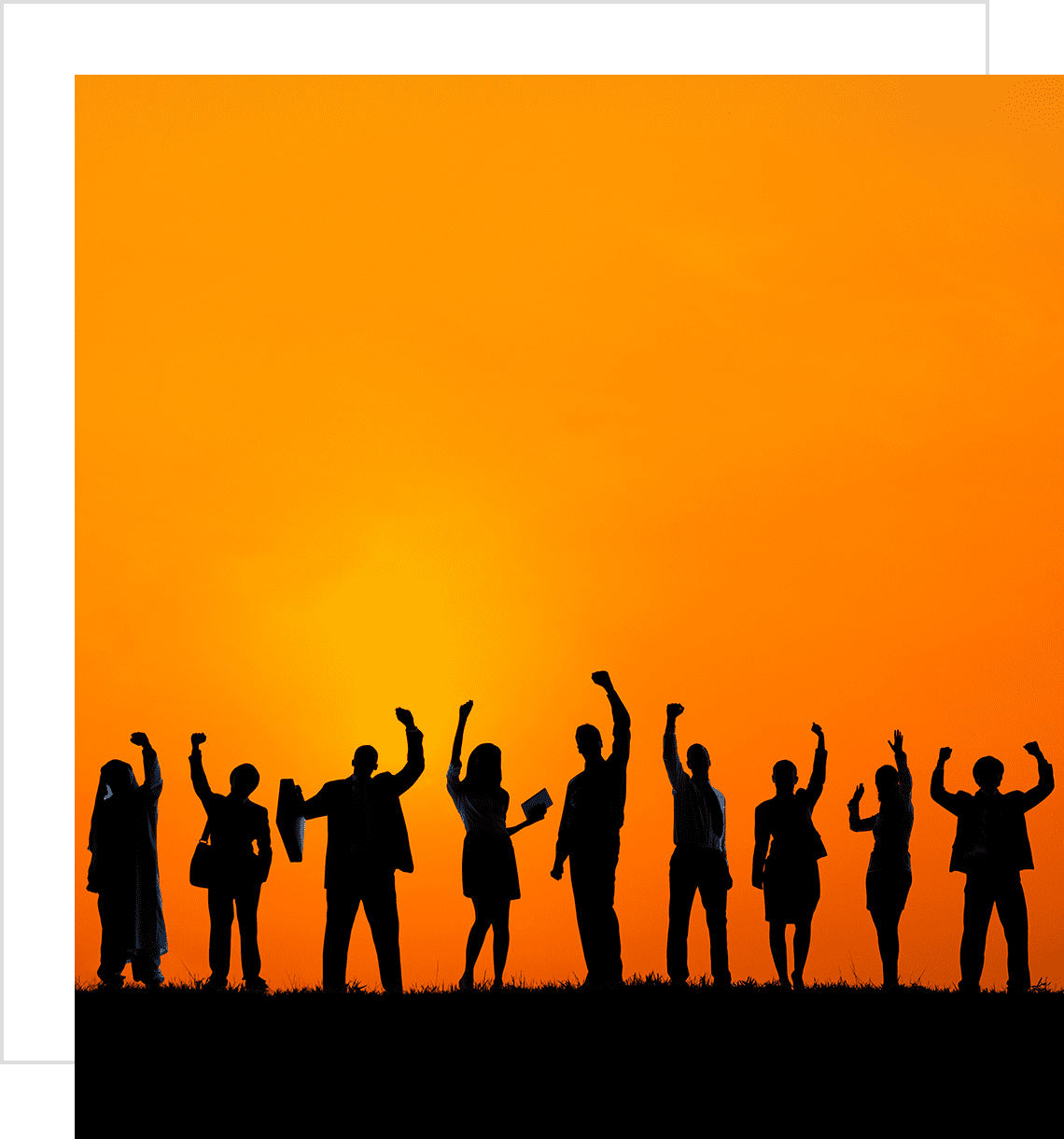 Silhouettes of children joyfully raising their hands against an orange sunset.