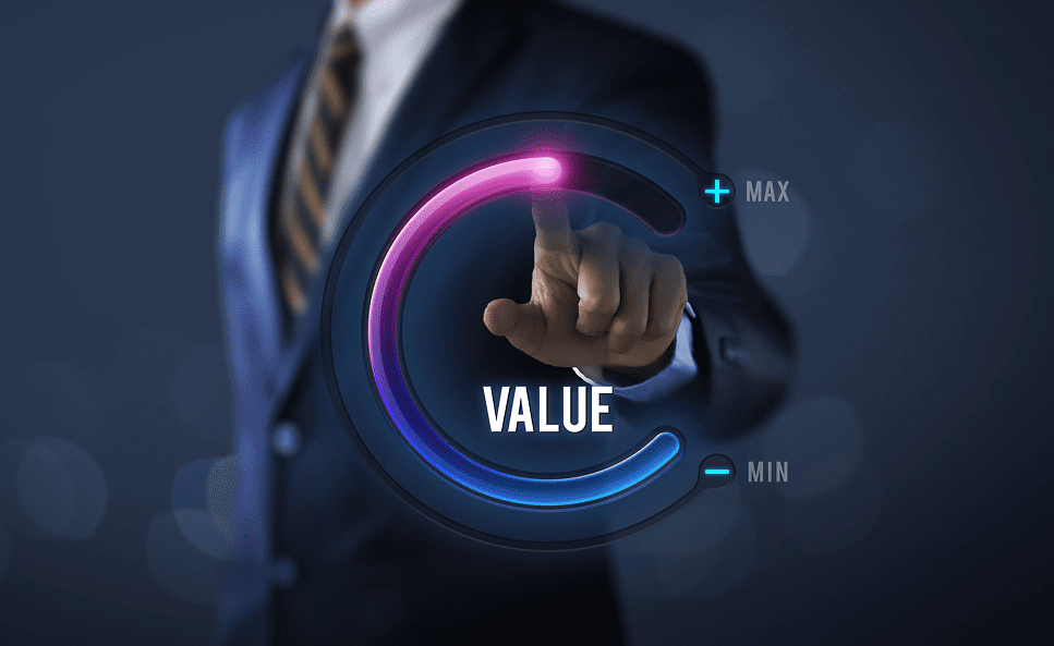 Businessman adjusting a digital value gauge from minimum to maximum.